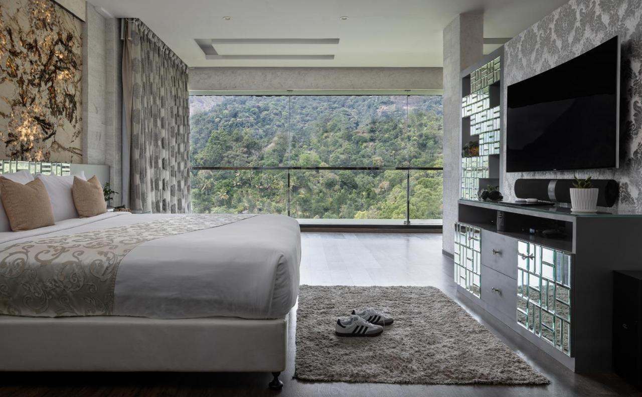 Hotel The Panoramic Getaway Munnar Zewnętrze zdjęcie A bedroom at the hotel