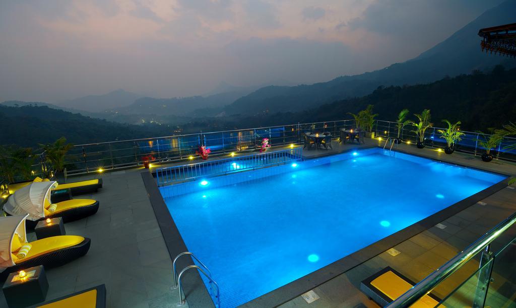 Hotel The Panoramic Getaway Munnar Zewnętrze zdjęcie The swimming pool at the resort